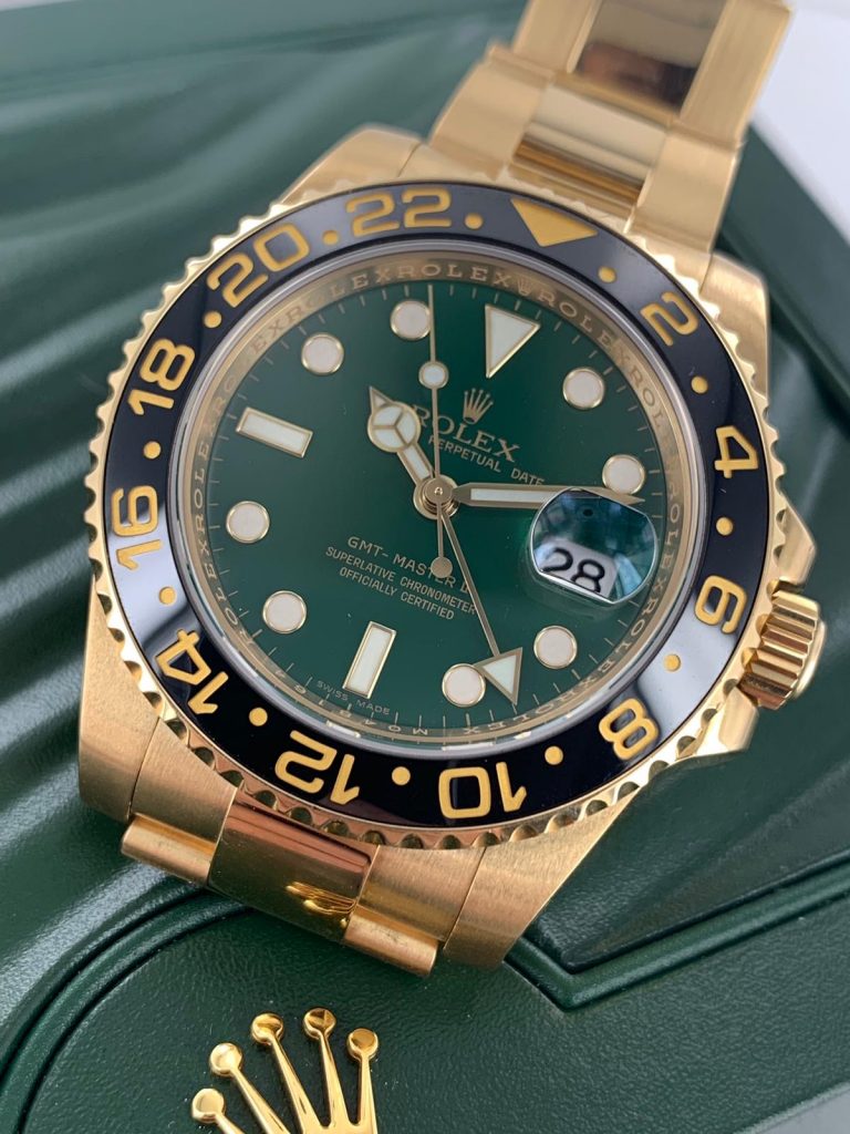 The 18ct gold fake watch has green dial.