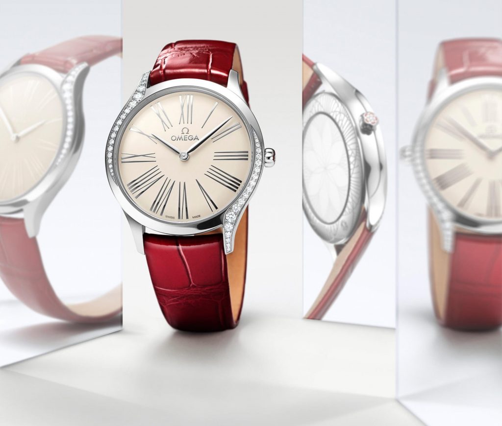 The red strap fake watch has a silvery dial.
